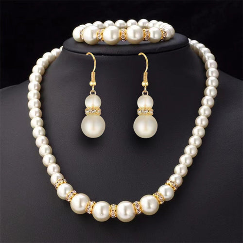 Pearl necklace, earrings and bracelet set