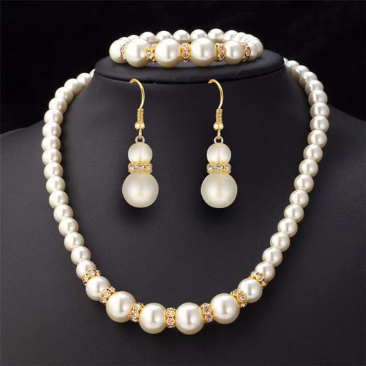 Pearl necklace, earrings and bracelet set
