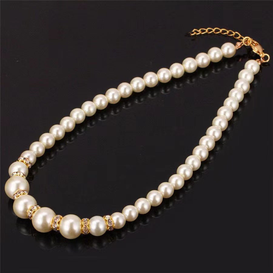 Pearl necklace, earrings and bracelet set