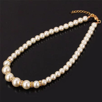Pearl necklace, earrings and bracelet set