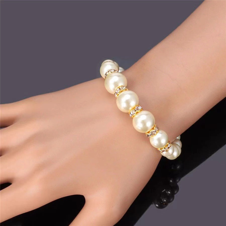 Pearl necklace, earrings and bracelet set