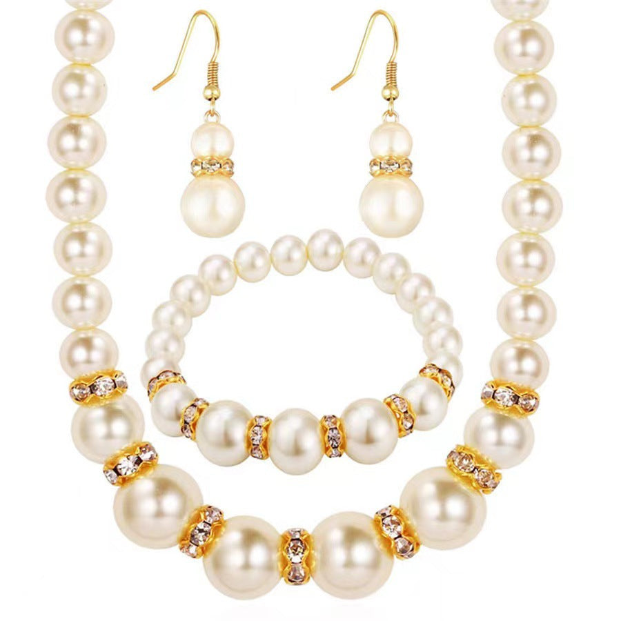 Pearl necklace, earrings and bracelet set
